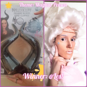 Theme Magical Person winner Les wearing a white wig, fairy wings, white makeup and white clothes. The prize is a pair of Maleficent horns.